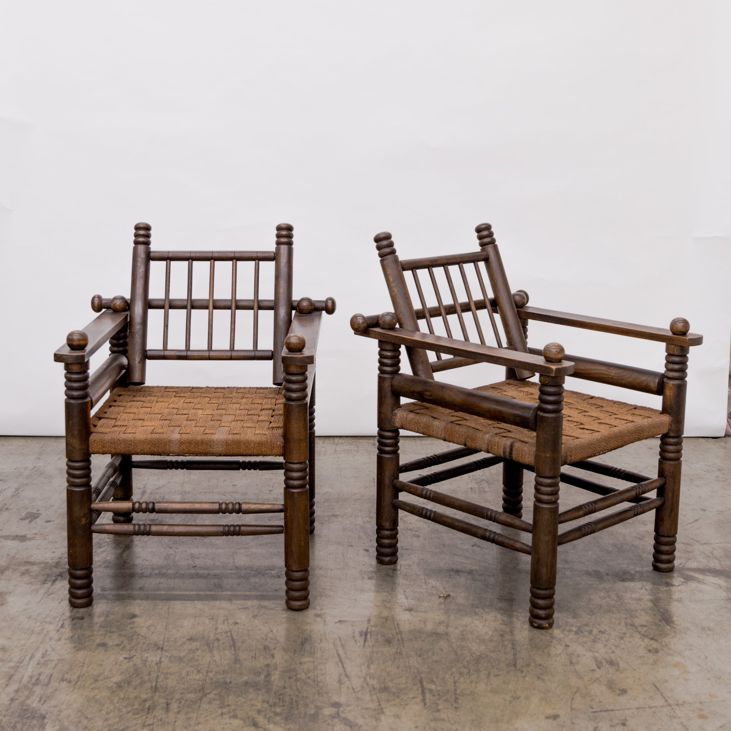 Charles Dudouyt | Turned Walnut + Rush Seat Armchairs