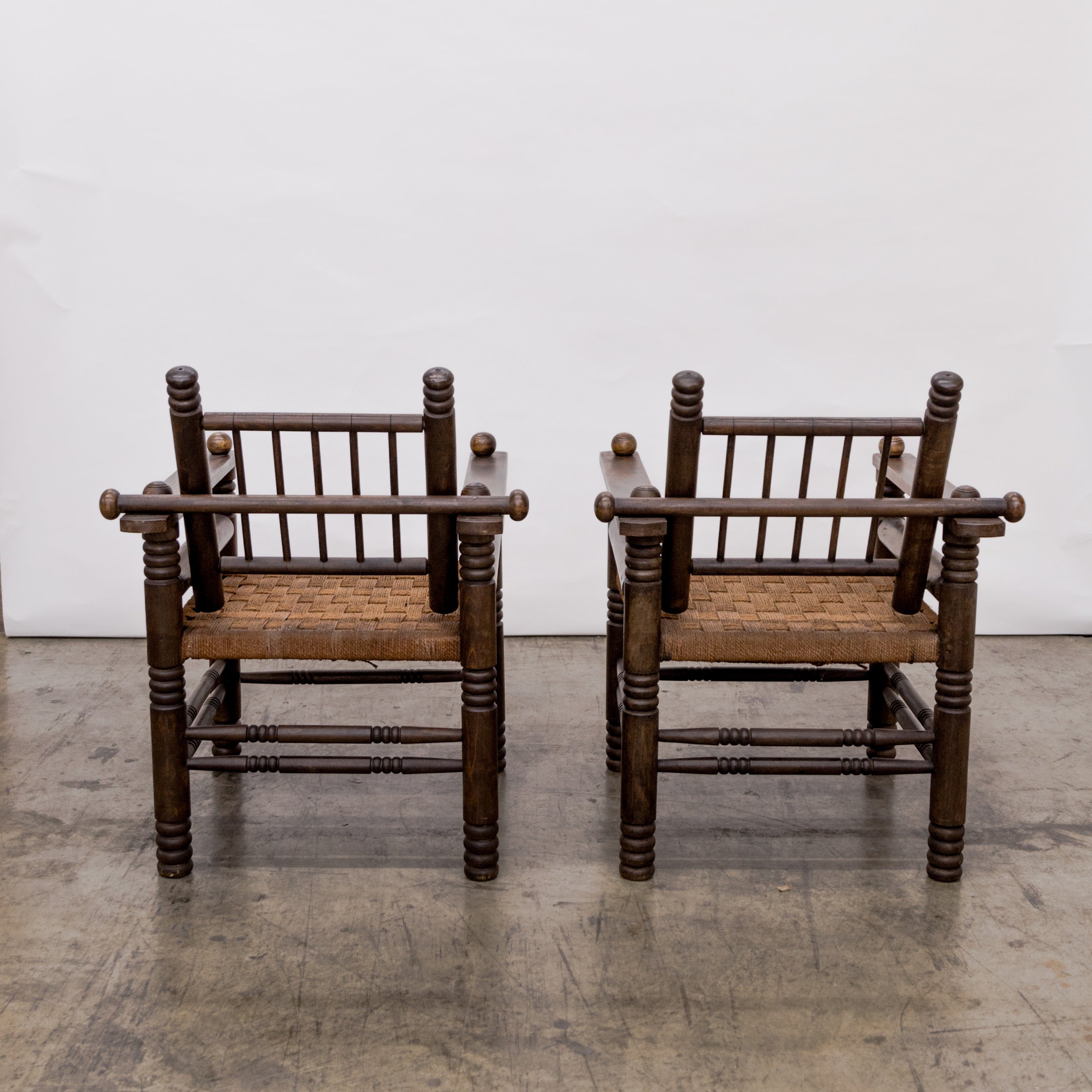 Charles Dudouyt | Turned Walnut + Rush Seat Armchairs